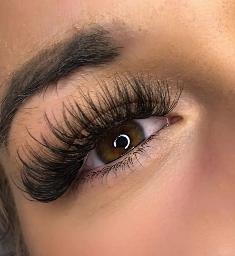 example of wispy hybrid lashes near me